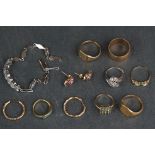 A small collection of hallmarked gold and silver jewellery to include rings, earrings and bracelet.