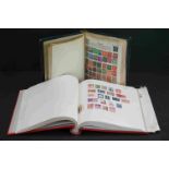 A collection of British and World stamps contained within two albums.