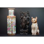 A contemporary Chinese ceramic vase together with a Chinese carved wooden figure and a ceramic cat.