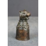 Small bronze stirrup cup with tiger head decoration