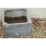 A galvanised steel water tank, measures approx 59cm x 59cm