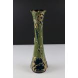 William Moorcroft for James MacIntyre Green and Gold decorated Florian ware Vase, 30cms high