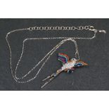 Silver and CZ pendant necklace in the form of a tropical bird