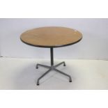 Charles & Ray Eames for Herman Miller, 20th century Oak Top Circular Table raised on an aluminium