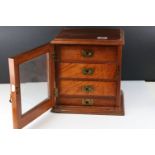 19th century Mahogany Collector's Cabinet, the glazed single door enclosing four drawers with