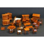 Collection of wooden dolls furniture.