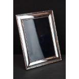 Silver framed wooden backed easel photo frame