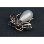 Silver and marcasite insect brooch with pearl body and ruby eyes