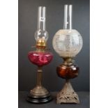 Victorian amber glass reservoir double wick oil lamp on metal Eiffel Tower base with chimney and