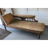 Victorian Carved Oak Framed Chaise-lounge raised on turned legs with castors, 182cms long x 78cms