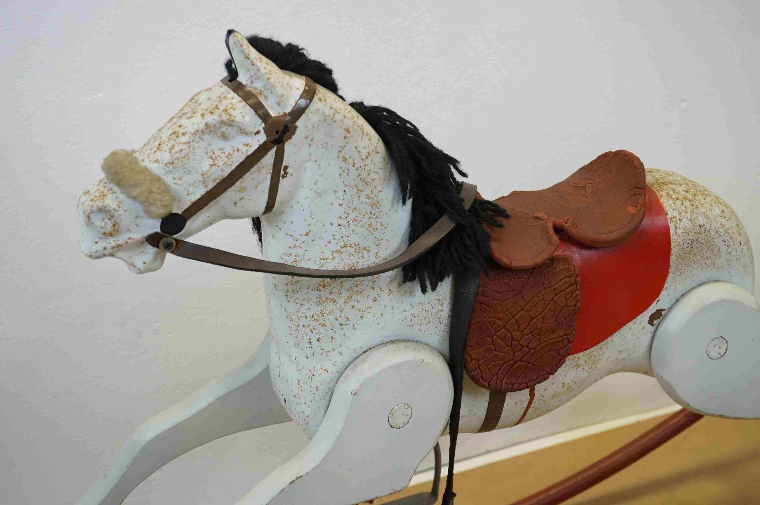 A vintage white rocking horse on red metal runners. - Image 2 of 4