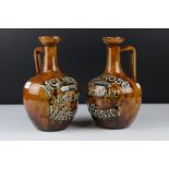 Pair of Doulton Lambeth, Melrose Highland Whisky, handled jugs