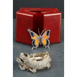 Silver butterfly brooch, marked 800, together with a gilt and diamanté lizard bangle