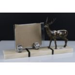 Art Deco Photograph Frame held on a marble base surmounted by a Spelter Stag, 38cms long