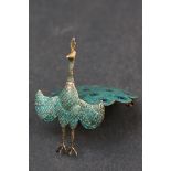 A vintage Siam silver and enamel Peacock brooch with hinged tail.