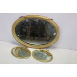 19th / Early 20th century Oval Gilt Framed Mirror, 89cms long together with a Pair of Small Gilt and