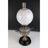 Late 19th century Aesthetic Movement Oil Lamp with lift out well and globular opaque glass shade,