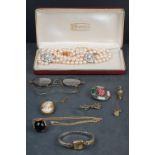 A small collection of vintage jewellery to include a 9ct gold cased ladies watch.