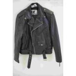 A Terminator 2 black leather jacket from universal studios Florida.