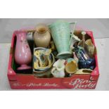 A large box of mixed ceramics to include vases, wall pockets, ornaments etc...