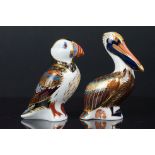Two Royal Crown Derby Paperweights in the form of a Puffin and Brown Pelican, largest 14cms high