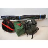 A large collection of fishing tackle to include rods, reels, various tackle and tackle boxes.