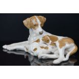 Bing & Grondahl Porcelain Group of a Pointer Dog with two puppies, model no. 2111, 31cms long