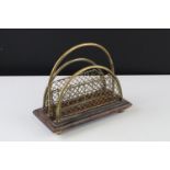 Edwardian Brass and Oak Two Division Letter / Stationery Rack raised on ball feet, 18cms long