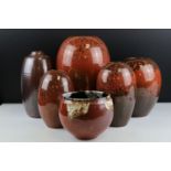 Six Studio Porcelain Vases - including four with an iron red mottled glaze, one with an iron red