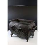 Antique Meiji Period bronze two handled planter, decorated with storks and mythical birds, signed,