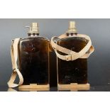 Pair of Early to Mid century Brown Glass ' Bambi ' Pest Control Ltd Bottles with leather and