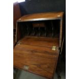 Early 20th century Queen Anne Revival Figured and Feather-banded Walnut Ladies Bureau, the sloping