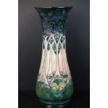 Moorcroft Vase decorated in the Cluny pattern, 31cms high