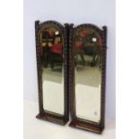 Pair of late 19th century arched top mirrors with all-over painted flower decoration, possibly