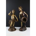 Two large cast brass figures of children collecting fruit, stand approx 39cm in height.