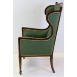 Edwardian Mahogany Inlaid Wing Back Armchair upholstered in green fabric, 124cms high x 60cms wide