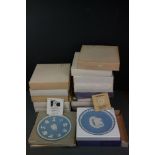 A collection of Wedgwood Christmas collectors plates together with a silver jubilee and a 1976