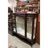 Early 20th century Mahogany Breakfront Display Cabinet by Maple & Co, the shaped top over a blind