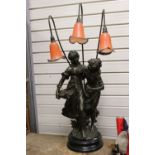 After Moreau, Large Cast Metal Bronzed Table Lamp in the form of Two Maidens, the three branches