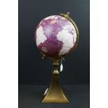 Decorative terrestrial globe on metal stand