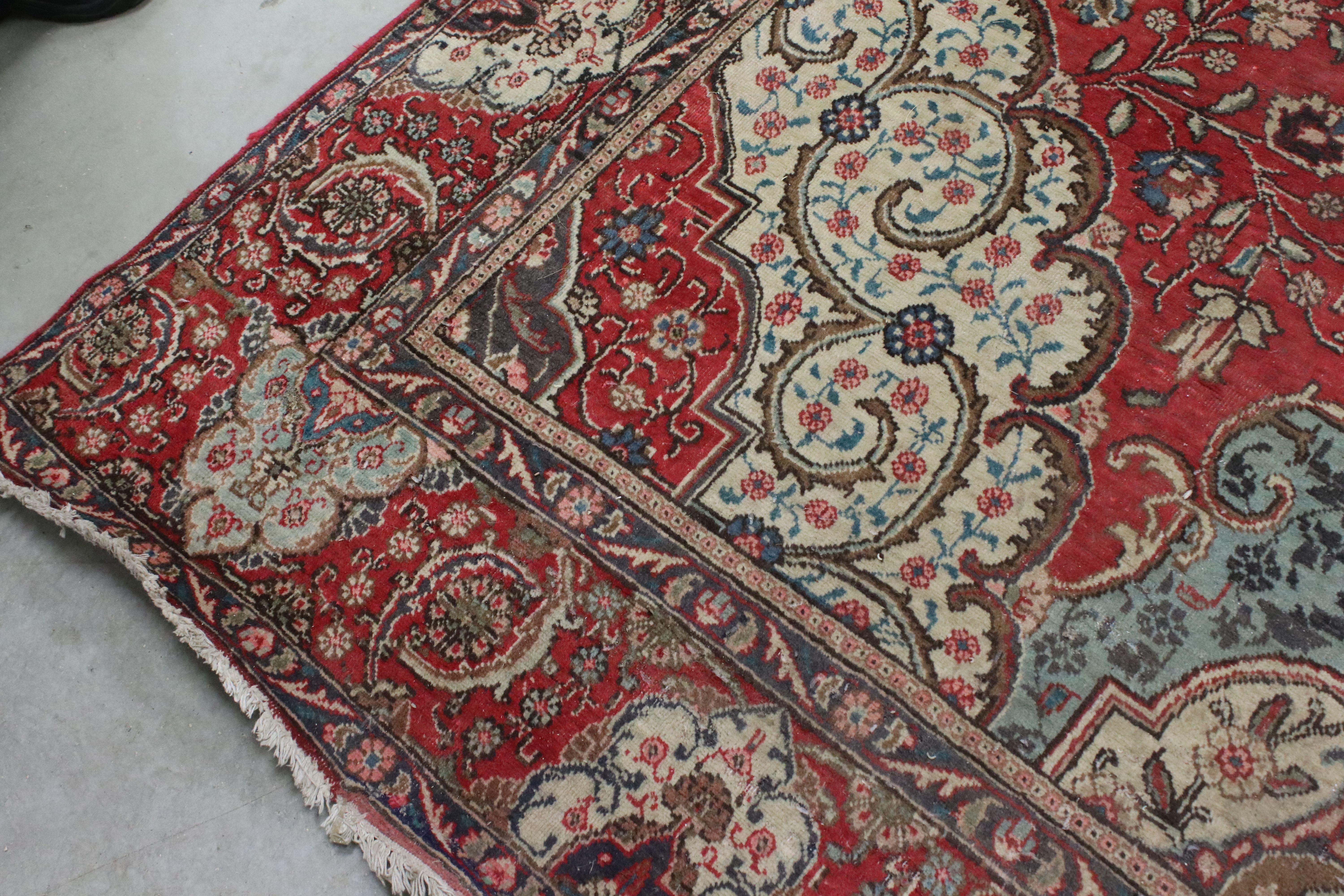 Large Wool Red Ground Rug with floral pattern within a border, 279cms x 396cms - Image 2 of 10
