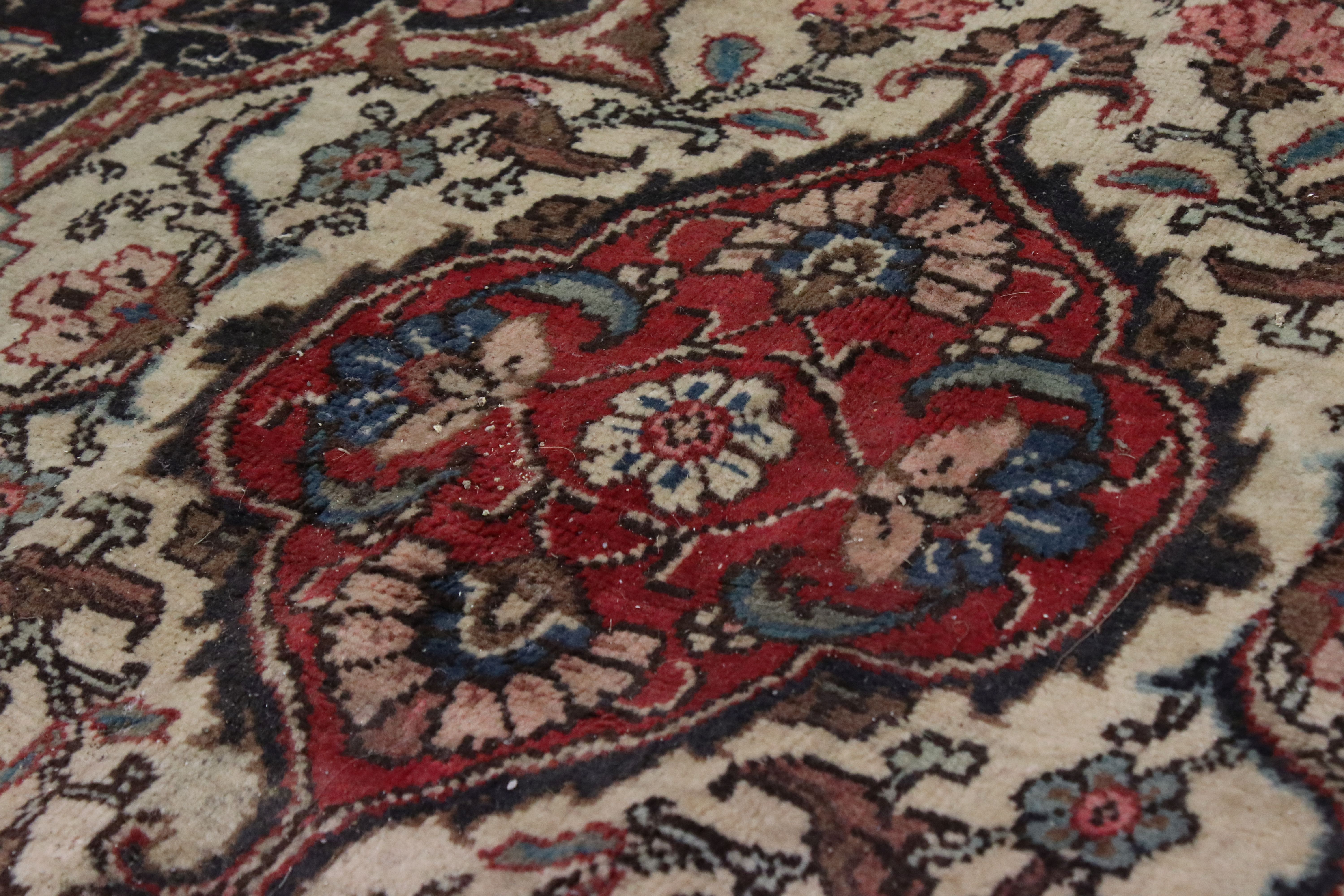 Large Wool Red Ground Rug with floral pattern within a border, 279cms x 396cms - Image 5 of 10
