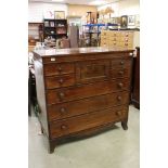 Early 19th century Mahogany Chest of Drawers comprising an arrangement of eight drawers, raised on