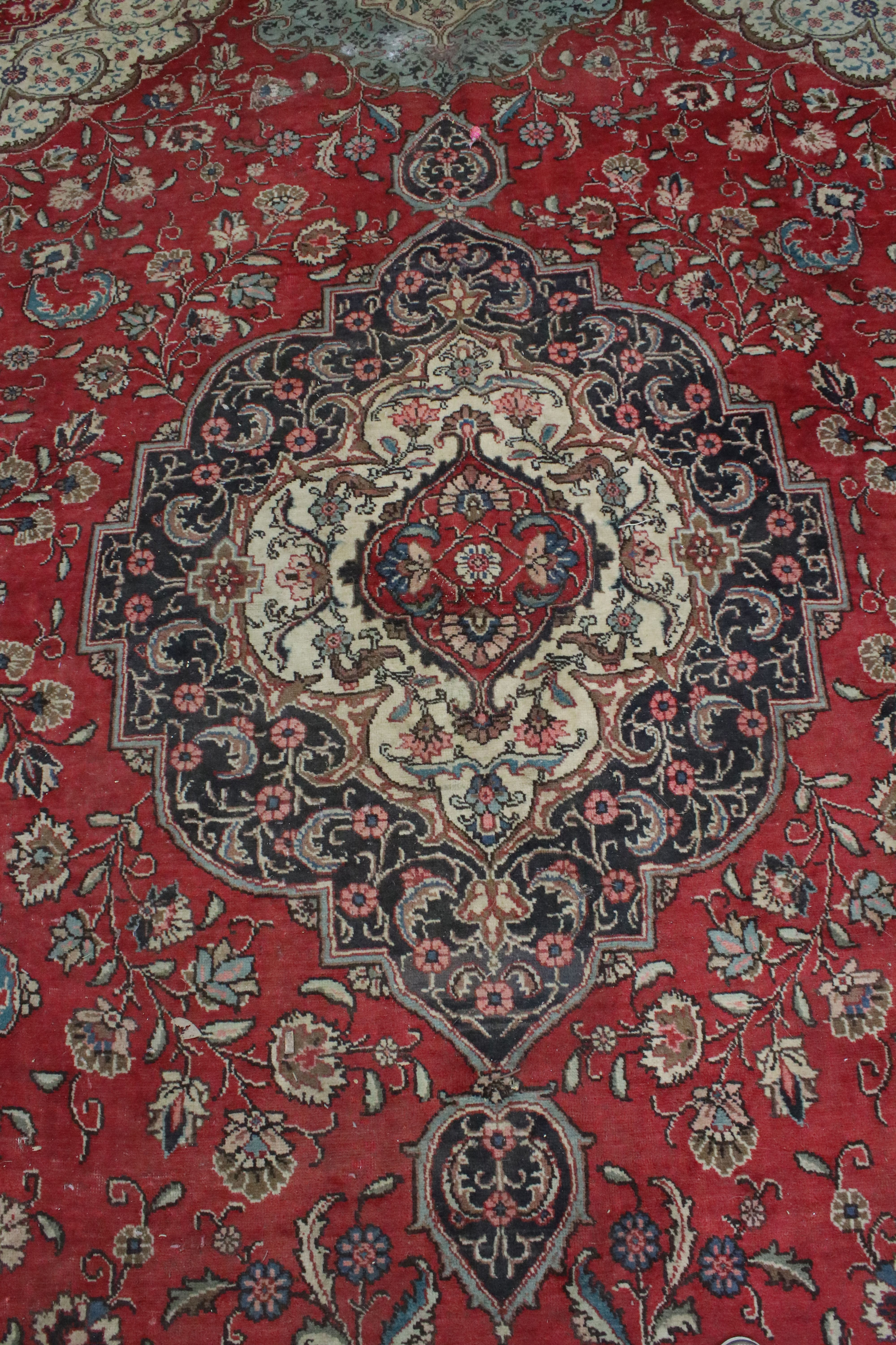 Large Wool Red Ground Rug with floral pattern within a border, 279cms x 396cms - Image 4 of 10