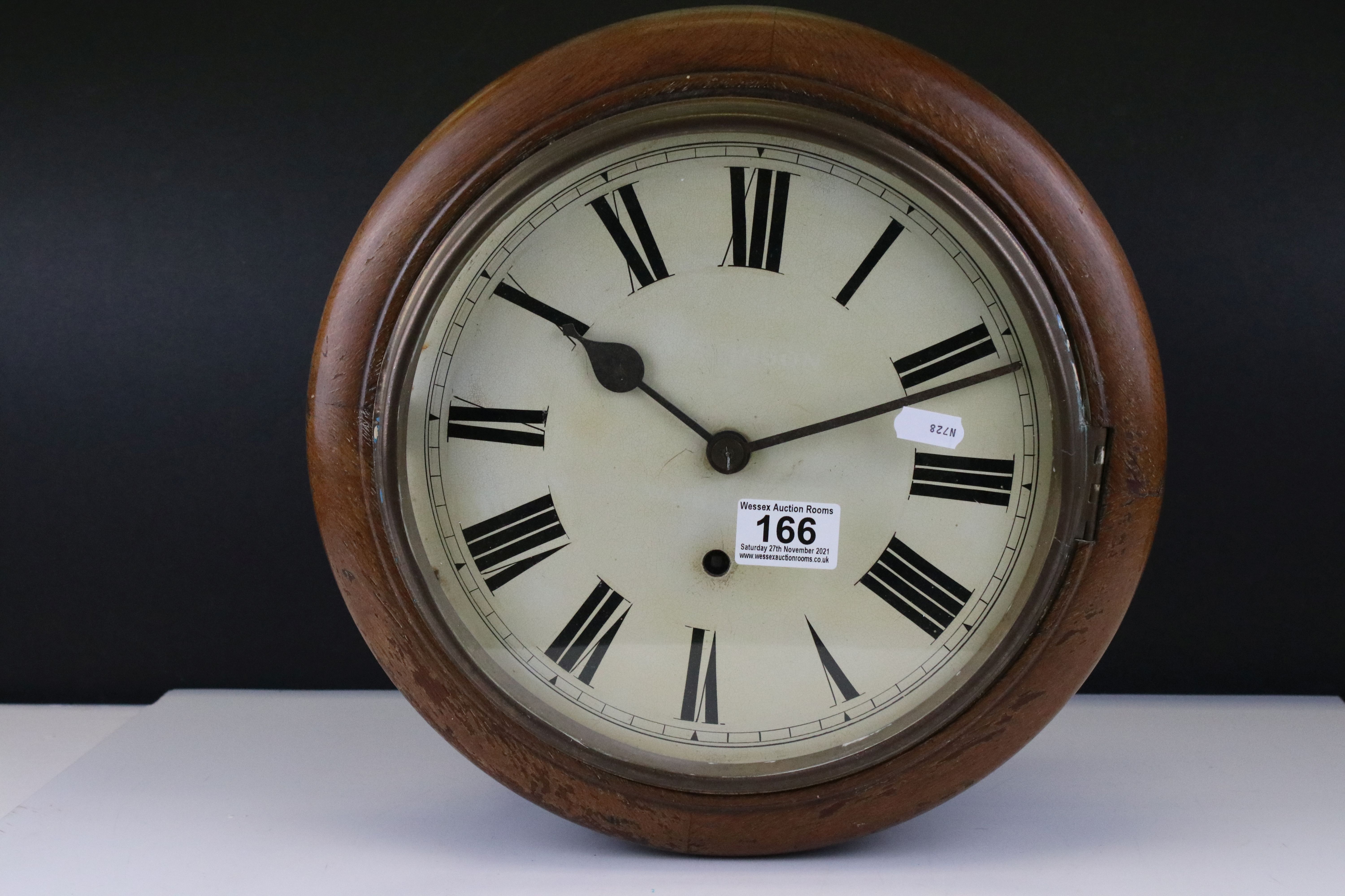 19th / Early 20th century Oak Circular Wall Hanging Clock, the white face with Roman numerals and