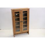 Pair of Modern Pine Floor Standing Collectors Display Cabinets, each with a pair of glazed doors