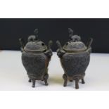 Pair of Japanese Bronze Lidded Urns decorated with mythical creatures, 18cms high