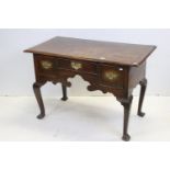 George II Oak Lowboy with three drawers and shaped apron, raised on four cabriole legs, 115cms