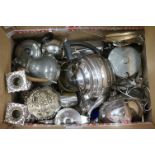 A collection of silver plate and pewter to include tea pots, candlesticks, dishes ..etc.
