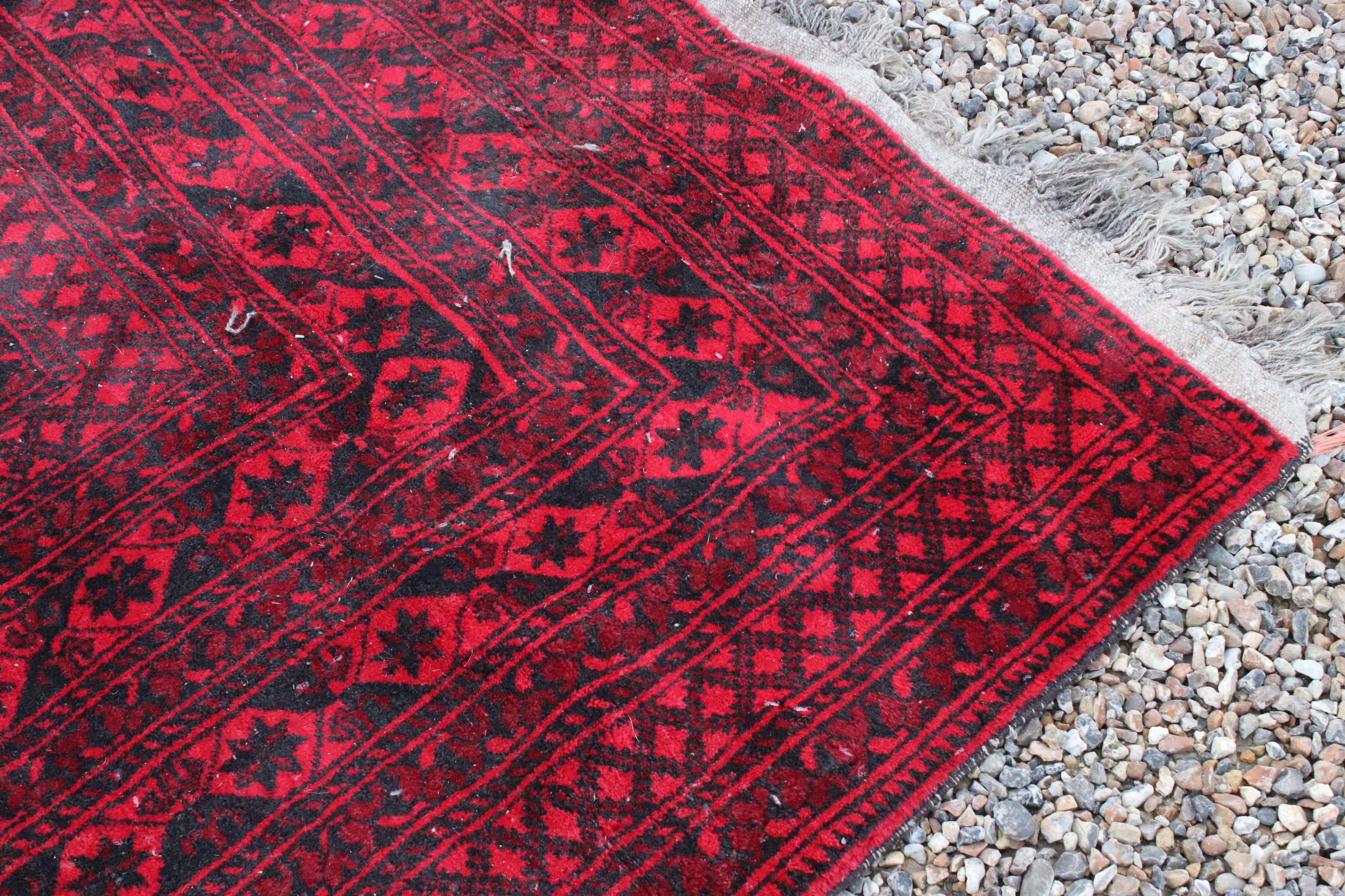 Large Wool Red Ground Rug with geometric pattern within a wide border, 417cms x 313cms - Image 6 of 10